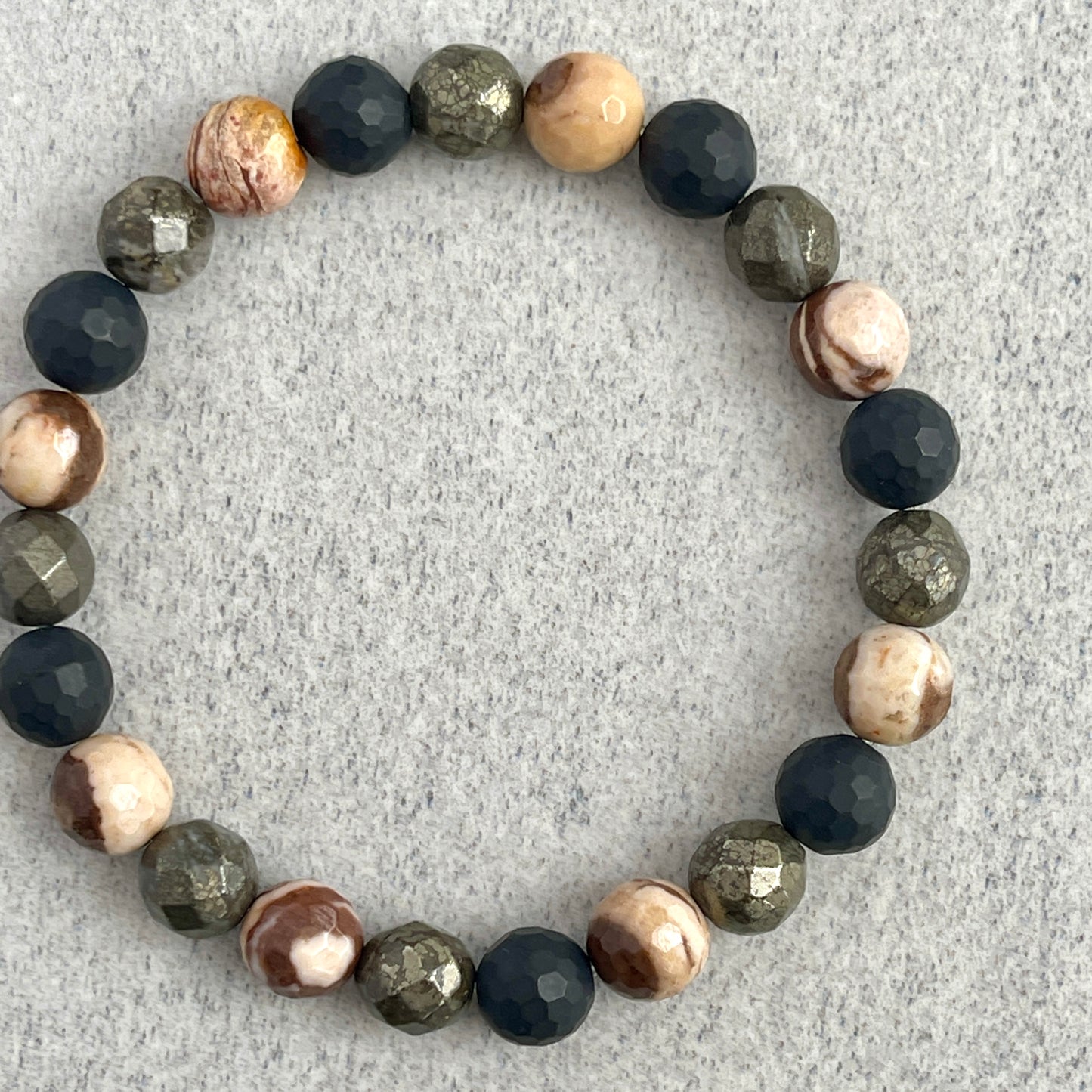 Faceted Brown Zebra Jasper, Matte Onyx and Pyrite Beaded Bracelet
