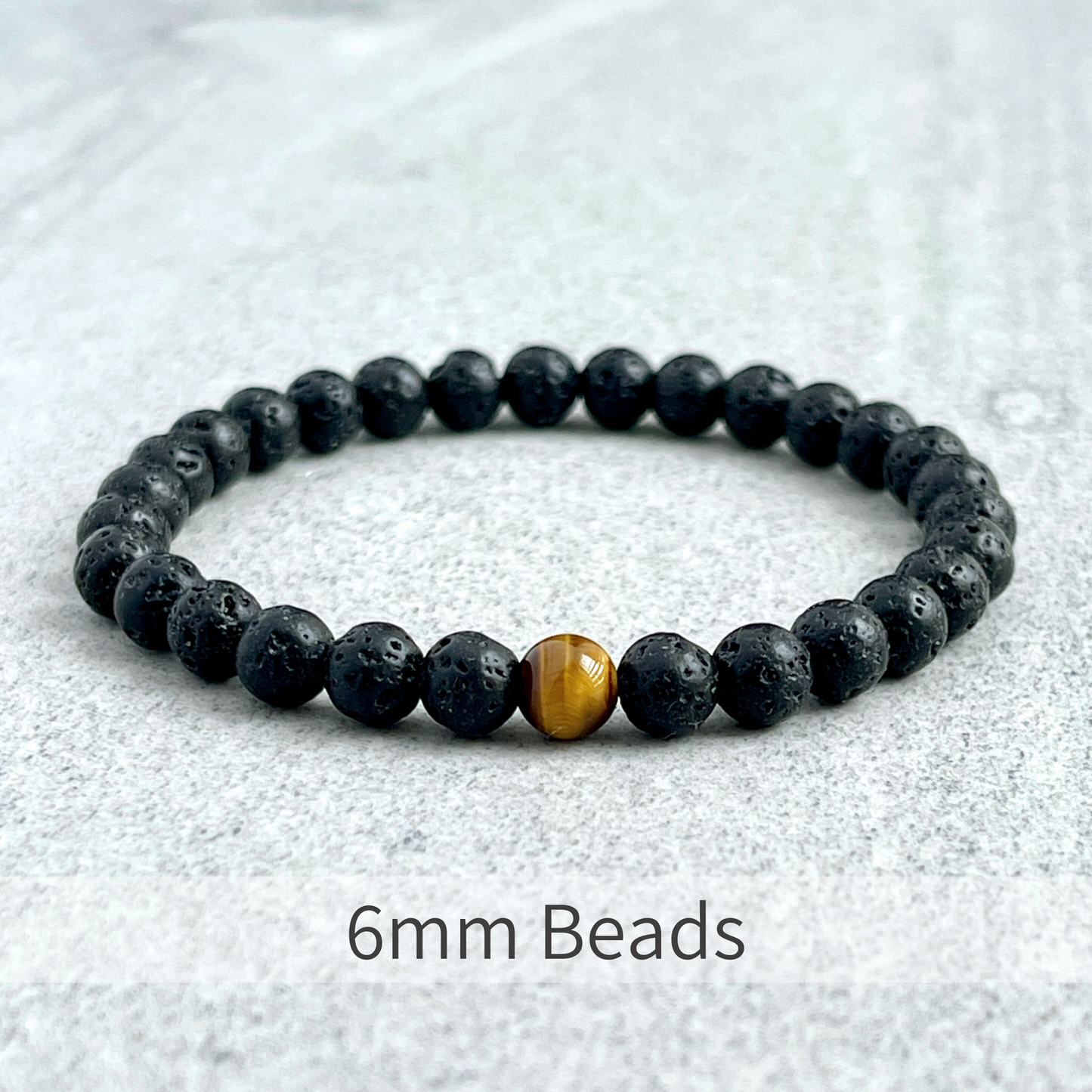 Black Lava and Single Yellow Tiger Eye Stretch Bracelet