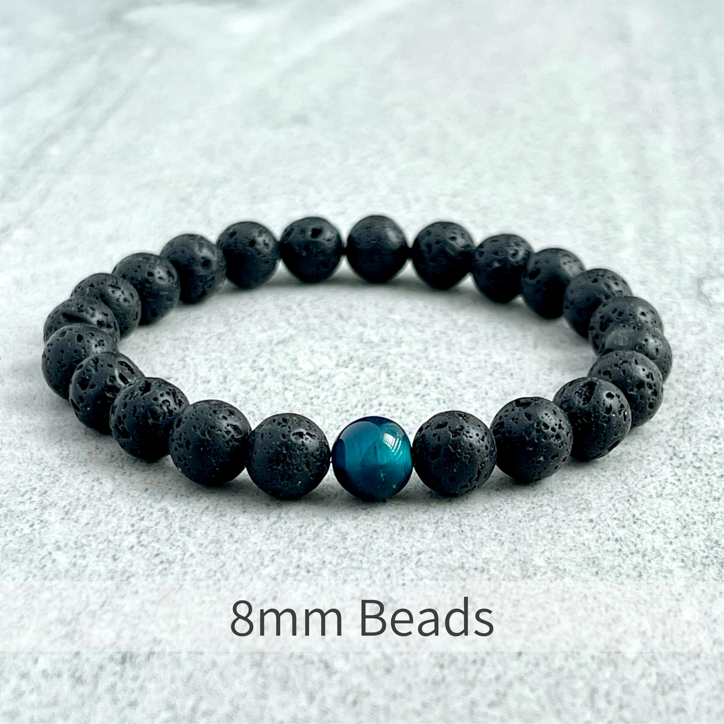 Black Lava and Single Aqua Blue Tiger Eye Stretch Bracelet