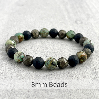 Faceted African Turquoise, Matte Onyx and Pyrite Beaded Bracelet