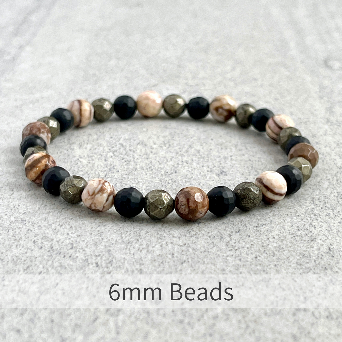 Faceted Brown Zebra Jasper, Matte Onyx and Pyrite Beaded Bracelet