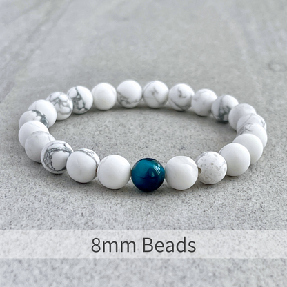 Matte White Howlite with a Single Aqua Blue Tiger Eye Stretch Bracelet