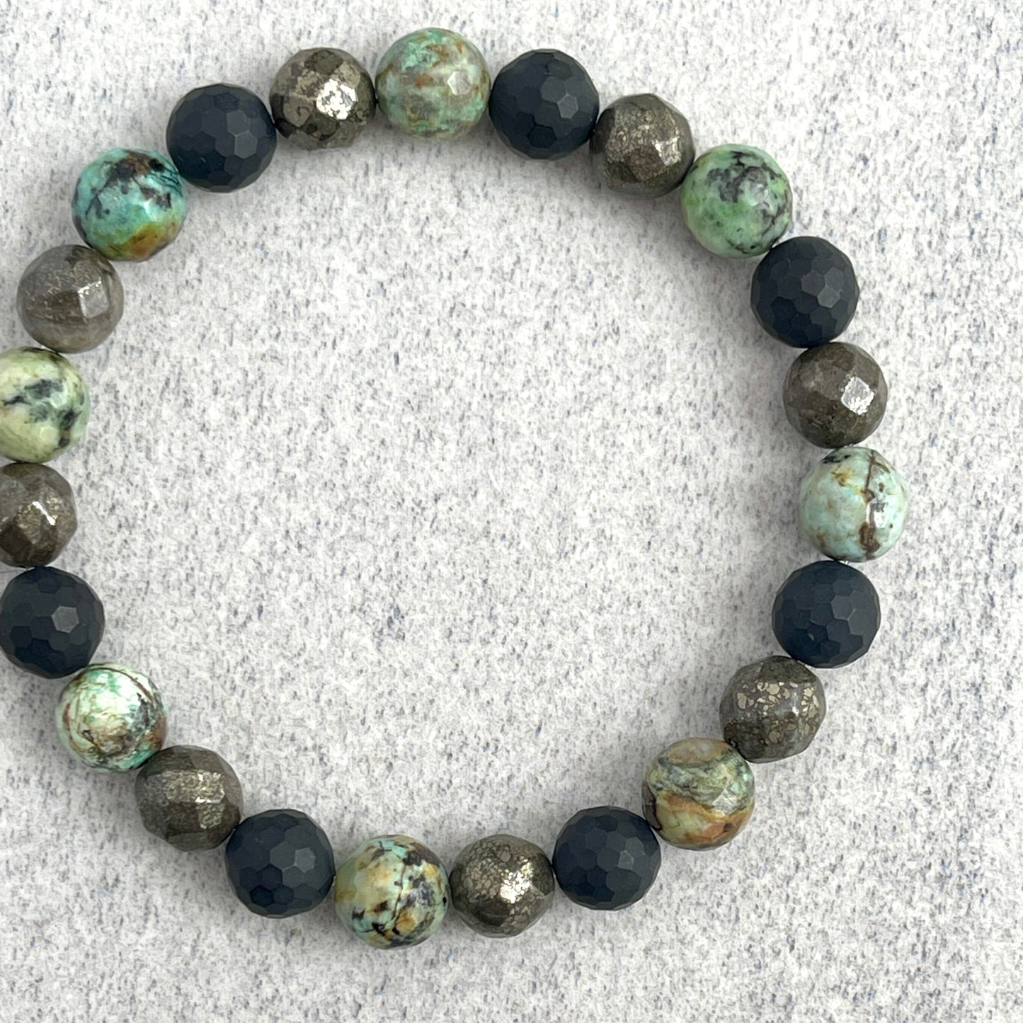 Faceted African Turquoise, Matte Onyx and Pyrite Beaded Bracelet