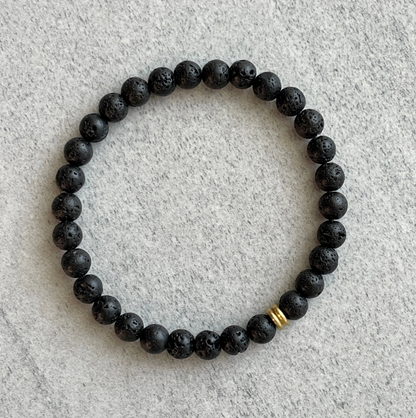 Black Lava Bracelet with Brass Accent Bead