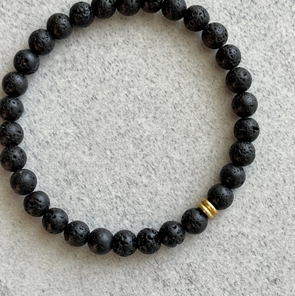 Black Lava Bracelet with Brass Accent Bead