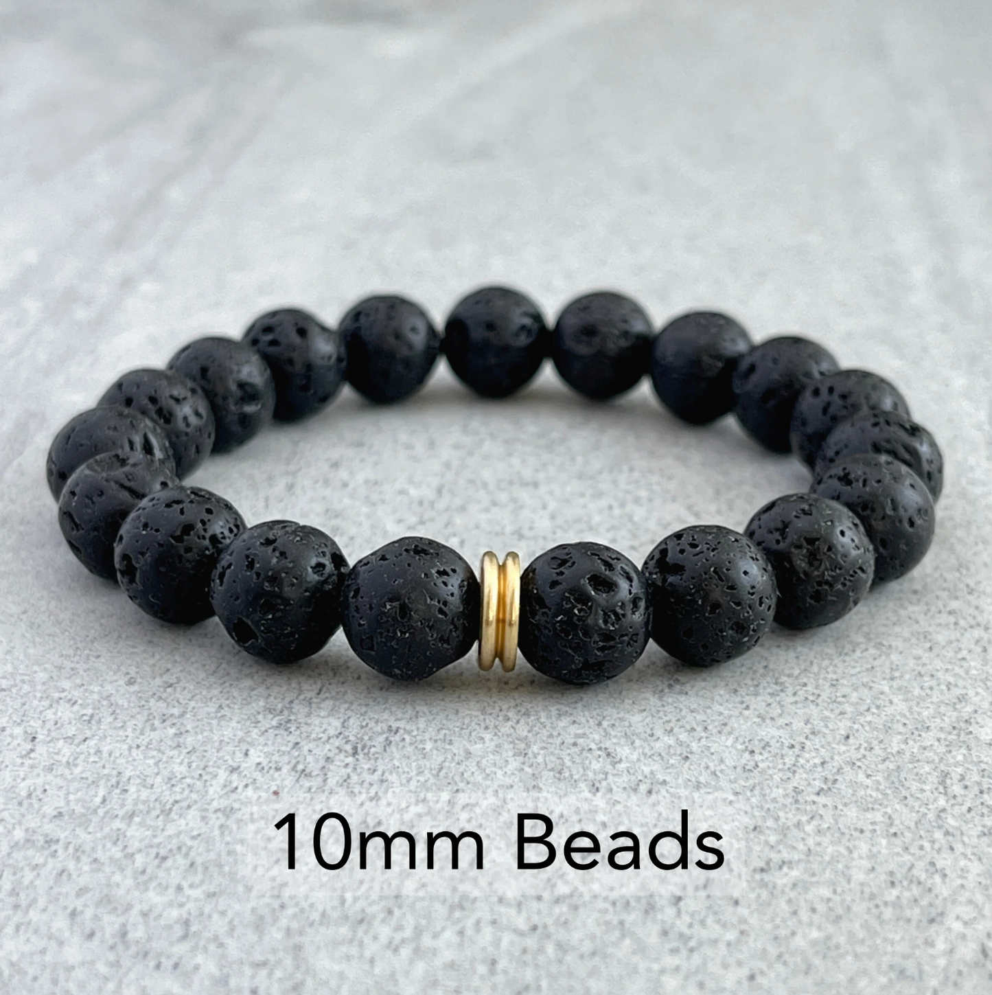 Black Lava Bracelet with Brass Accent Bead