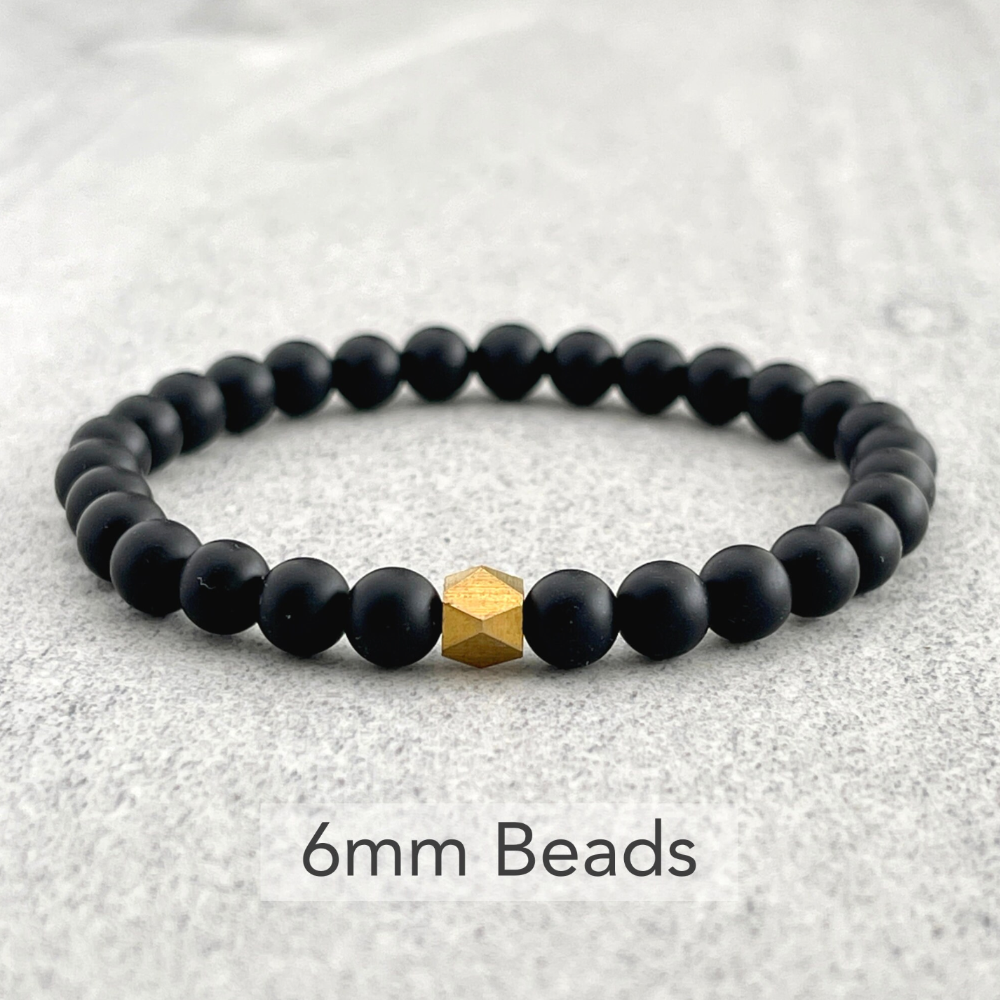 Matte Onyx Beaded Bracelet with Faceted Brass Bead