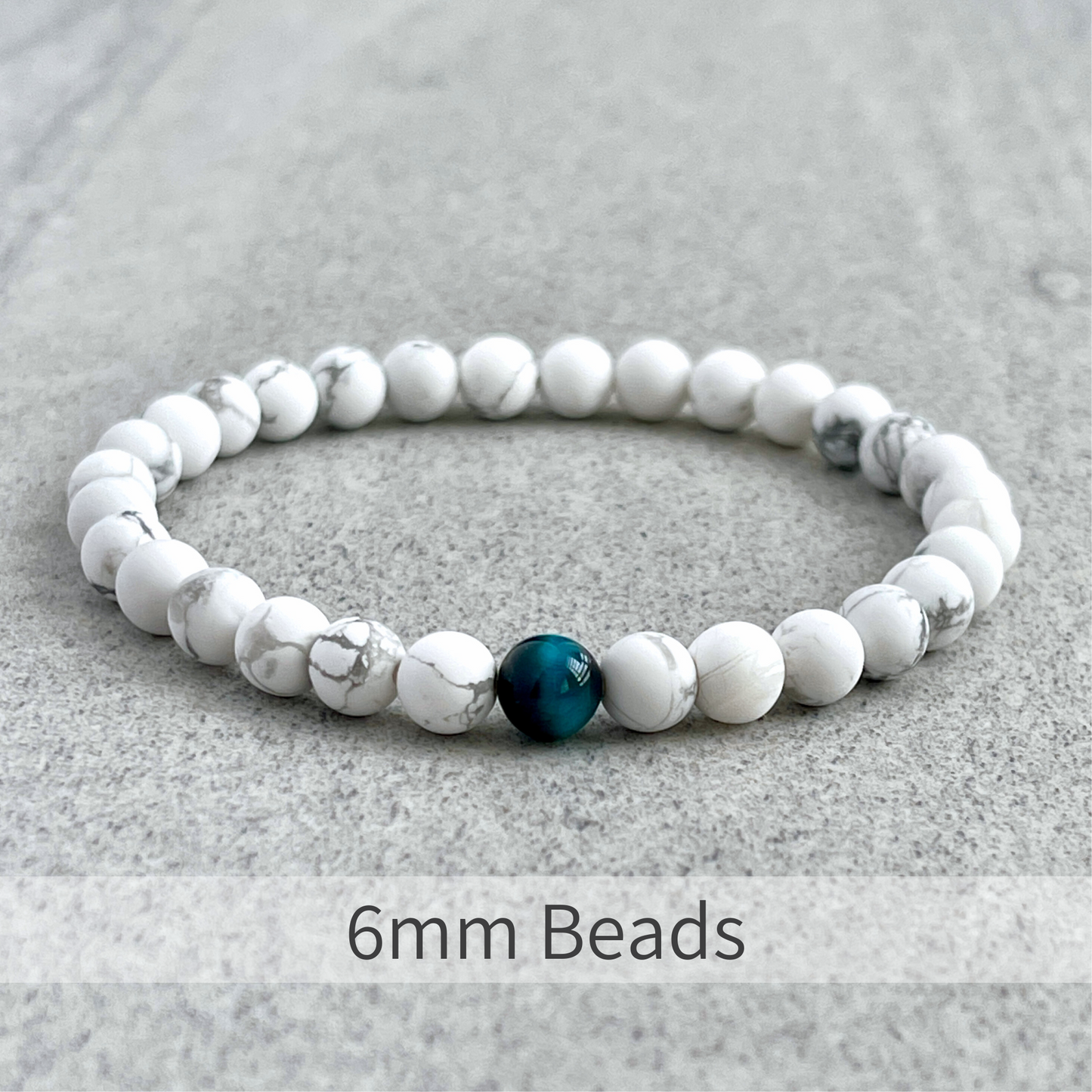 Matte White Howlite with a Single Aqua Blue Tiger Eye Stretch Bracelet