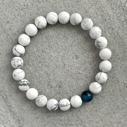 Matte White Howlite with a Single Aqua Blue Tiger Eye Stretch Bracelet