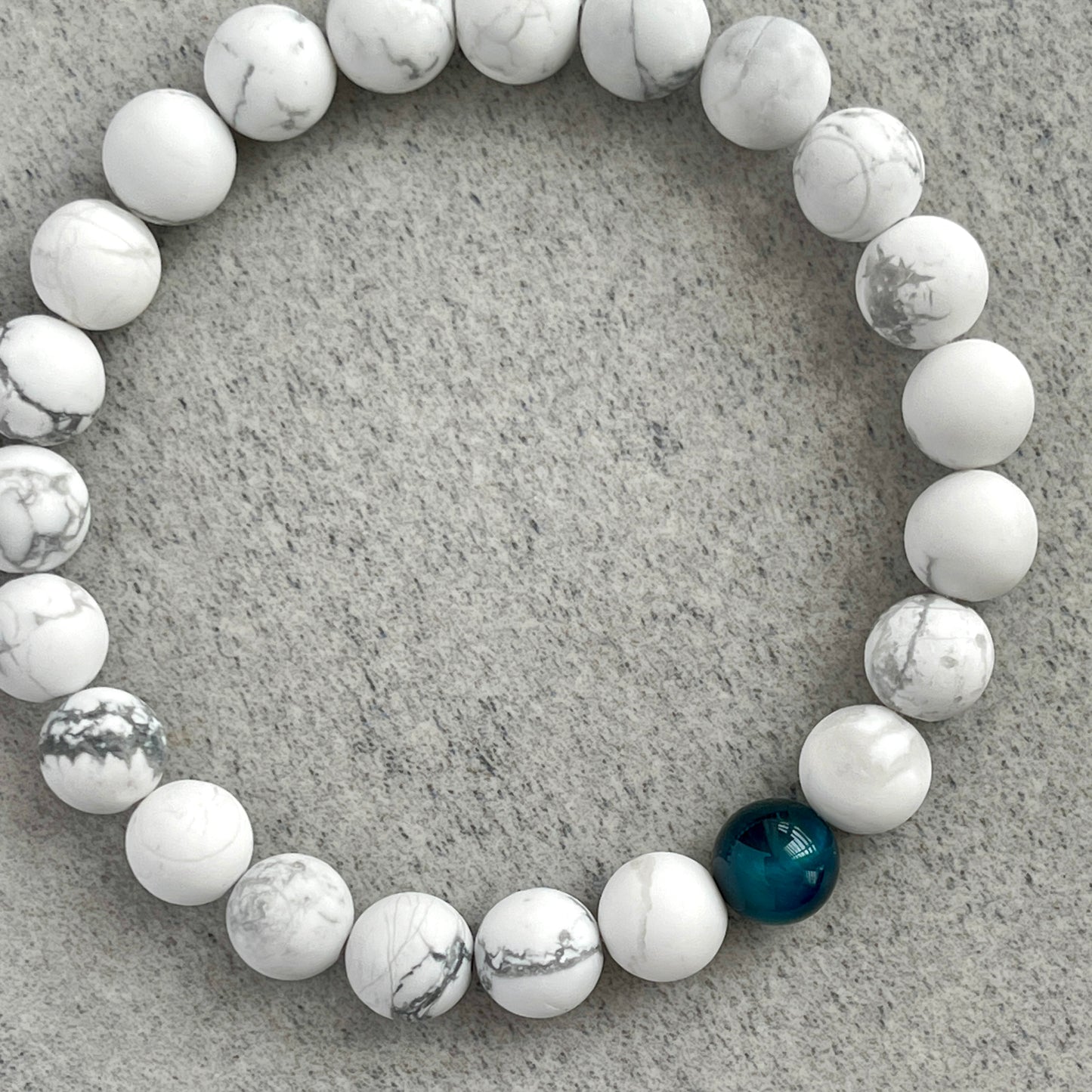 Matte White Howlite with a Single Aqua Blue Tiger Eye Stretch Bracelet