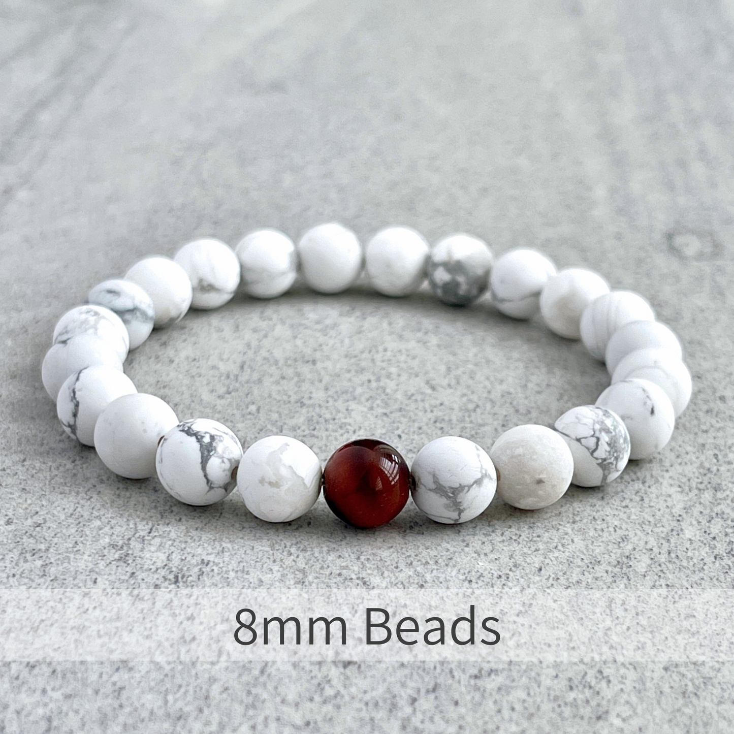 Matte White Howlite with a Single Red Tiger Eye Bracelet