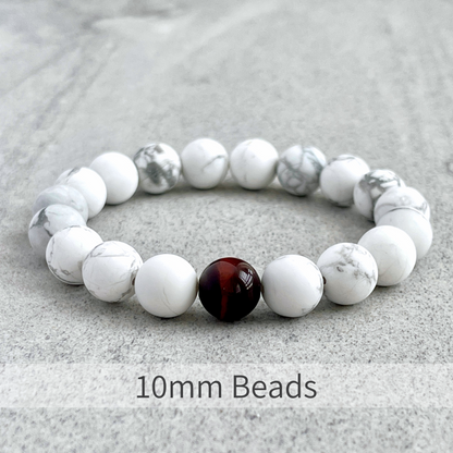 Matte White Howlite with a Single Red Tiger Eye Bracelet