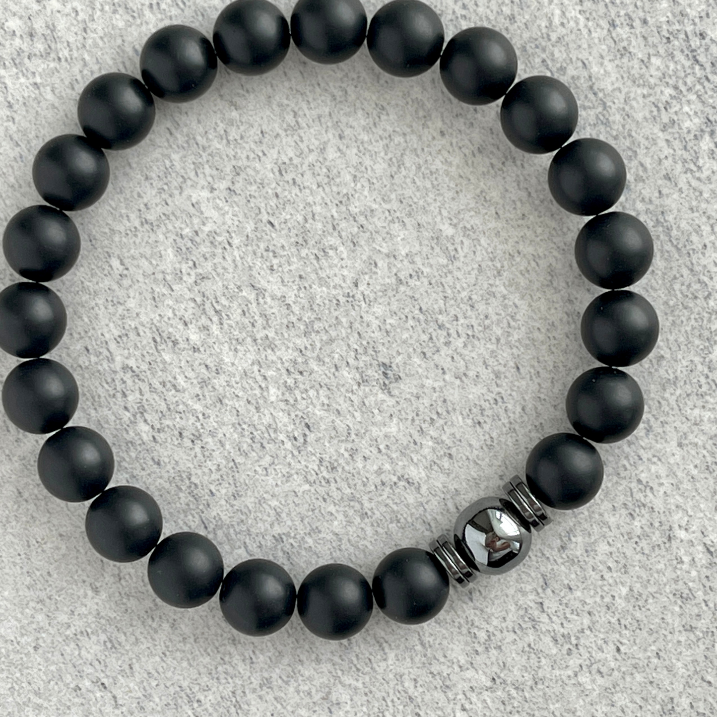 Matte Onyx Bracelet with a Single Hematite