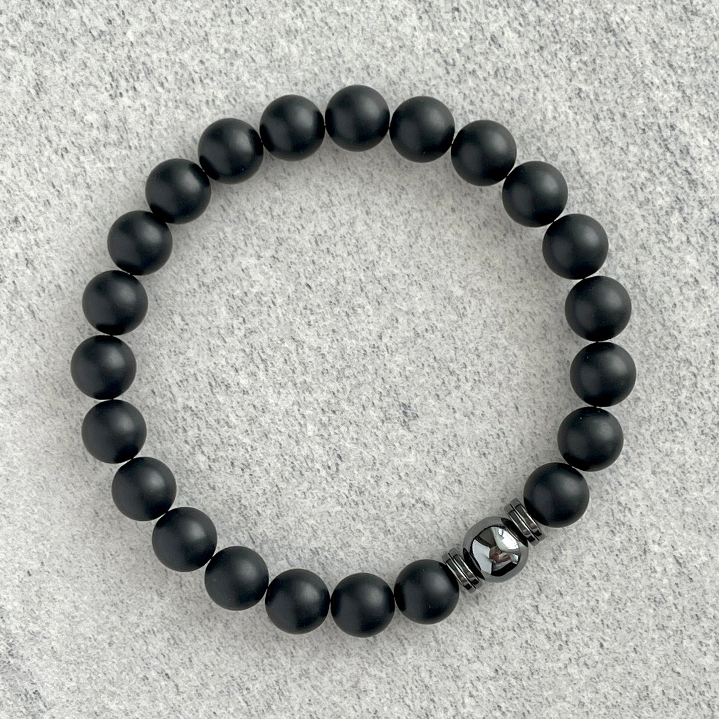 Matte Onyx Bracelet with a Single Hematite