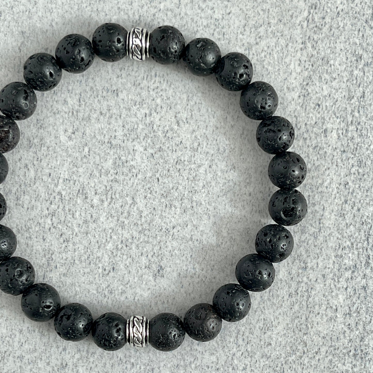 Black Lava Beaded Stretch Bracelet with Celtic Accent Bead