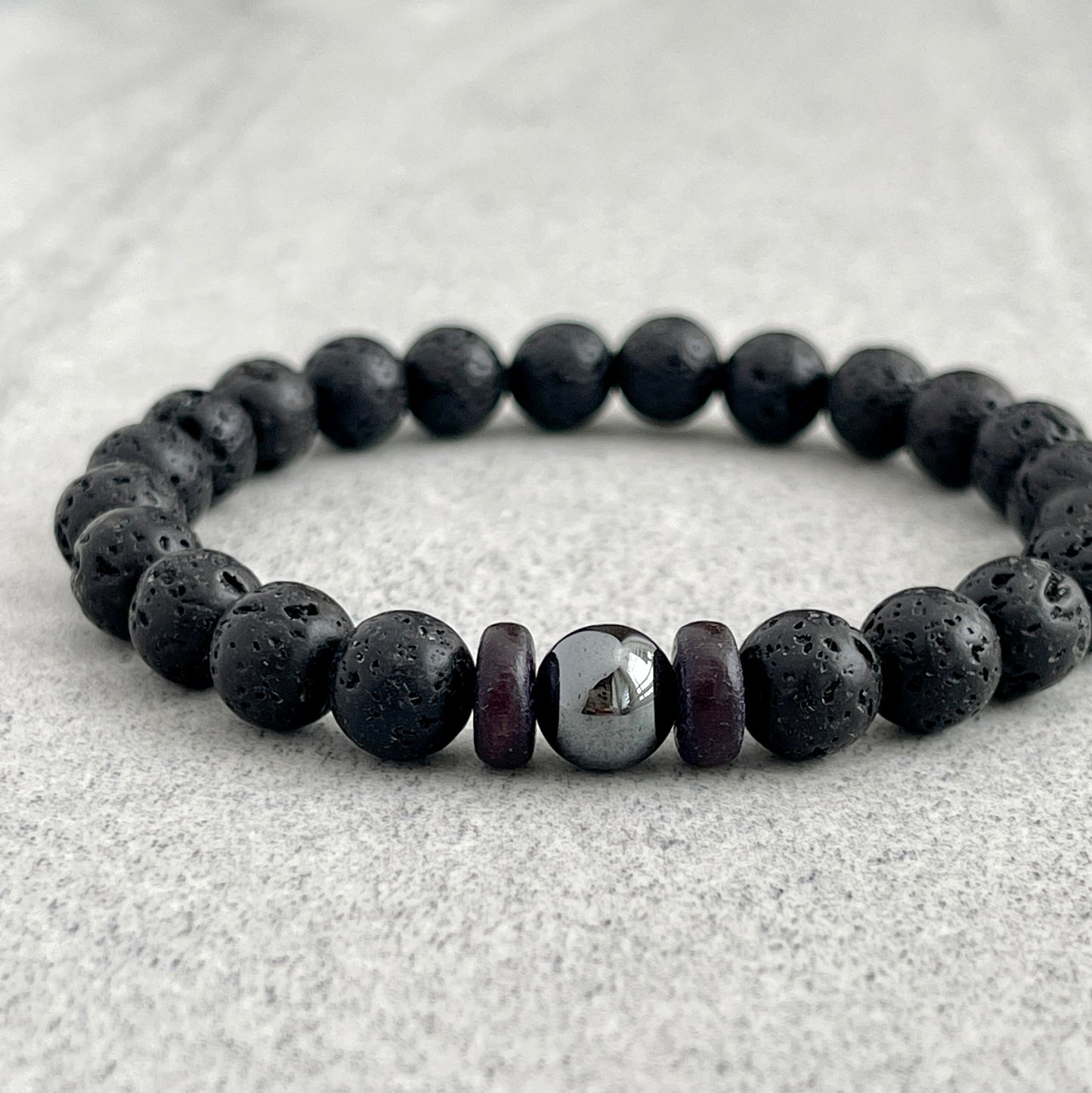 Black Lava Bracelet with a Single Hematite