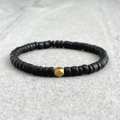 Black Coconut Wood Beaded Bracelet with Faceted Brass Bead