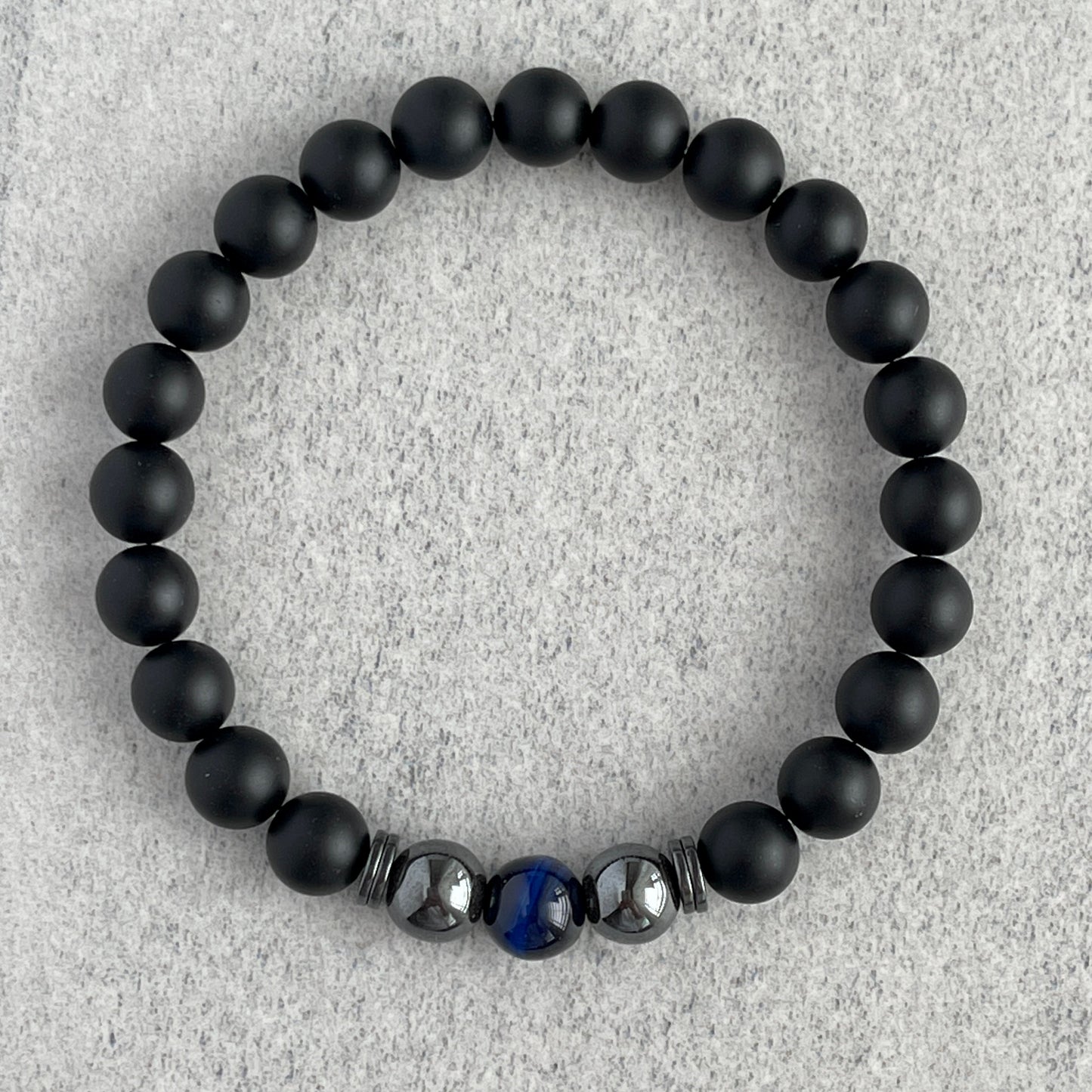 Matte Onyx and Blue Tiger Eye bracelet accented with Hematite beads