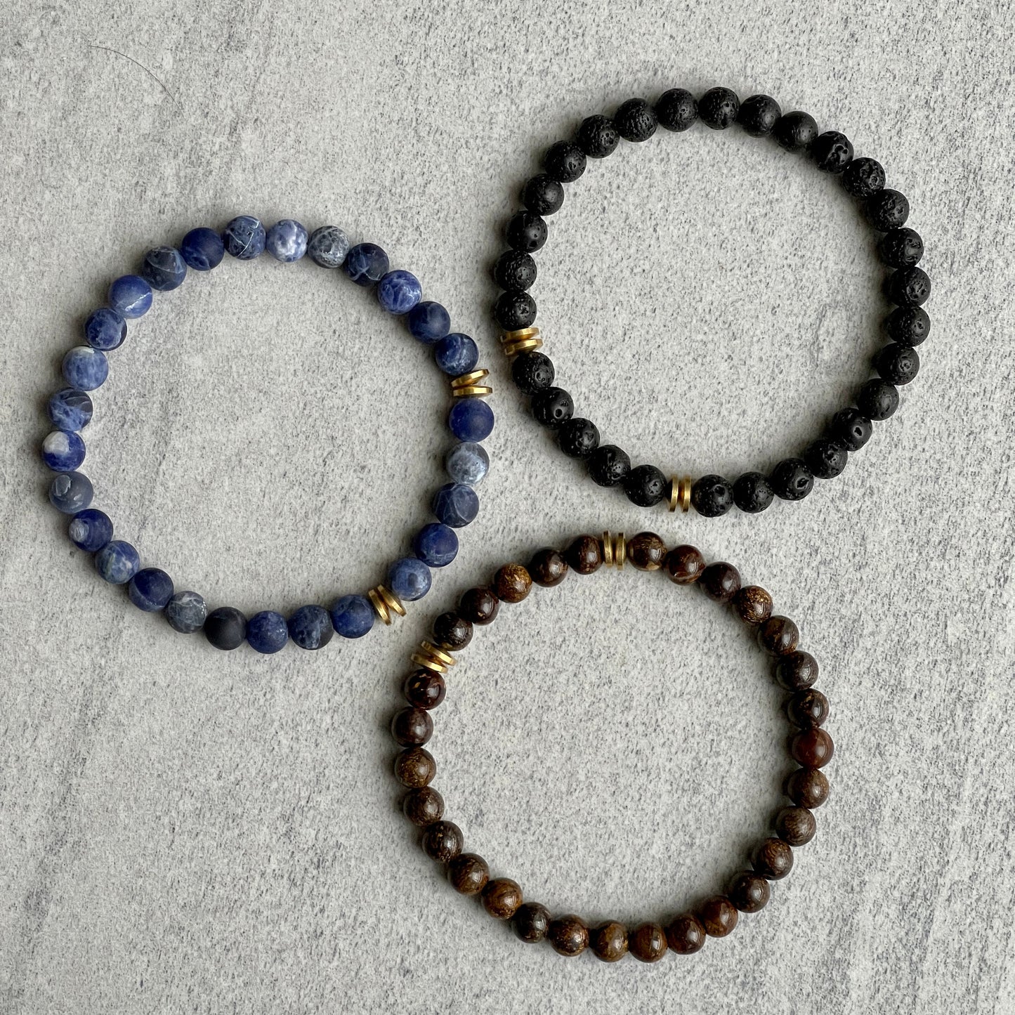 Black Lava Bracelet with Brass Rondelles