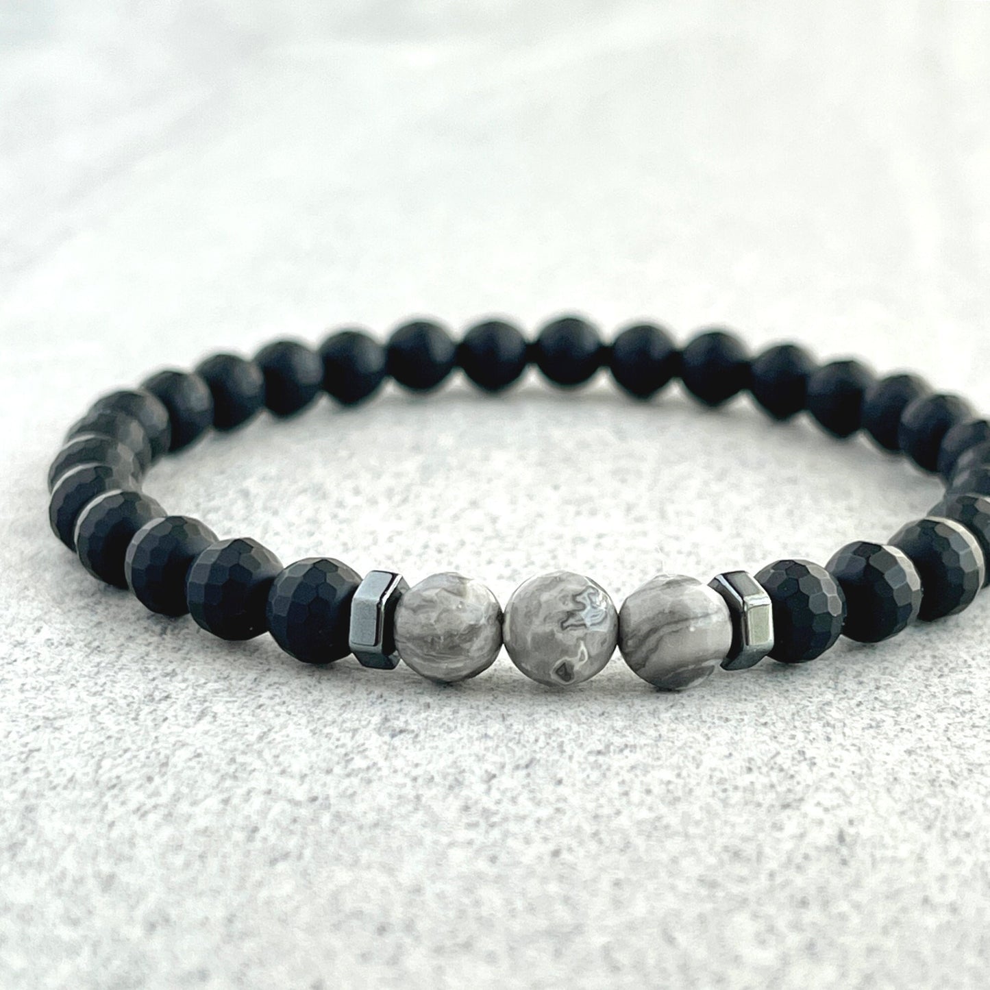 Faceted matte onyx with grey picasso jasper beaded bracelet for men