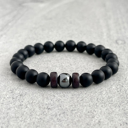 Matte Onyx Bracelet with a Single Hematite