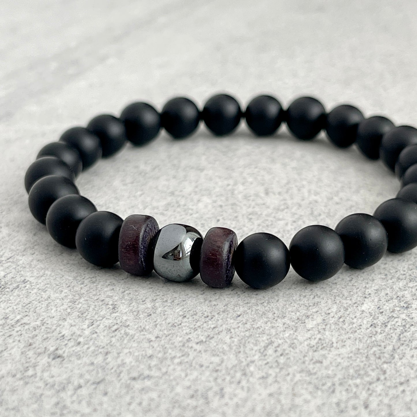 Matte Onyx Bracelet with a Single Hematite